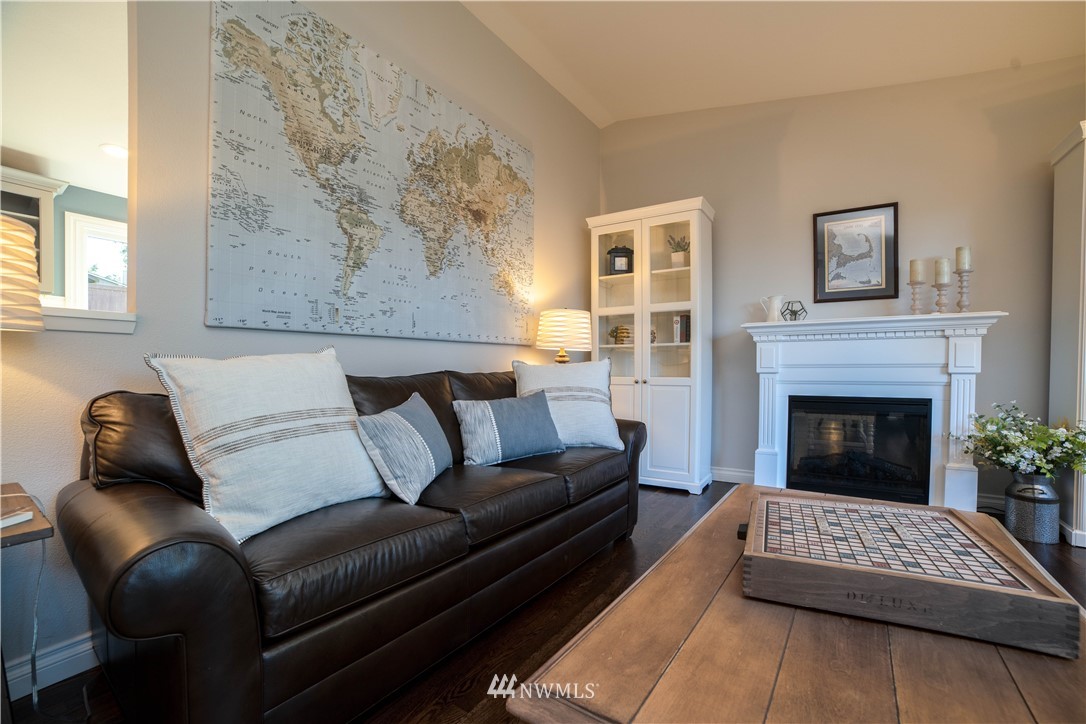 16714 3rd Avenue Southeast Bothell, WA 98012 - Photo 6 of 40 a living room with furniture and a fireplace