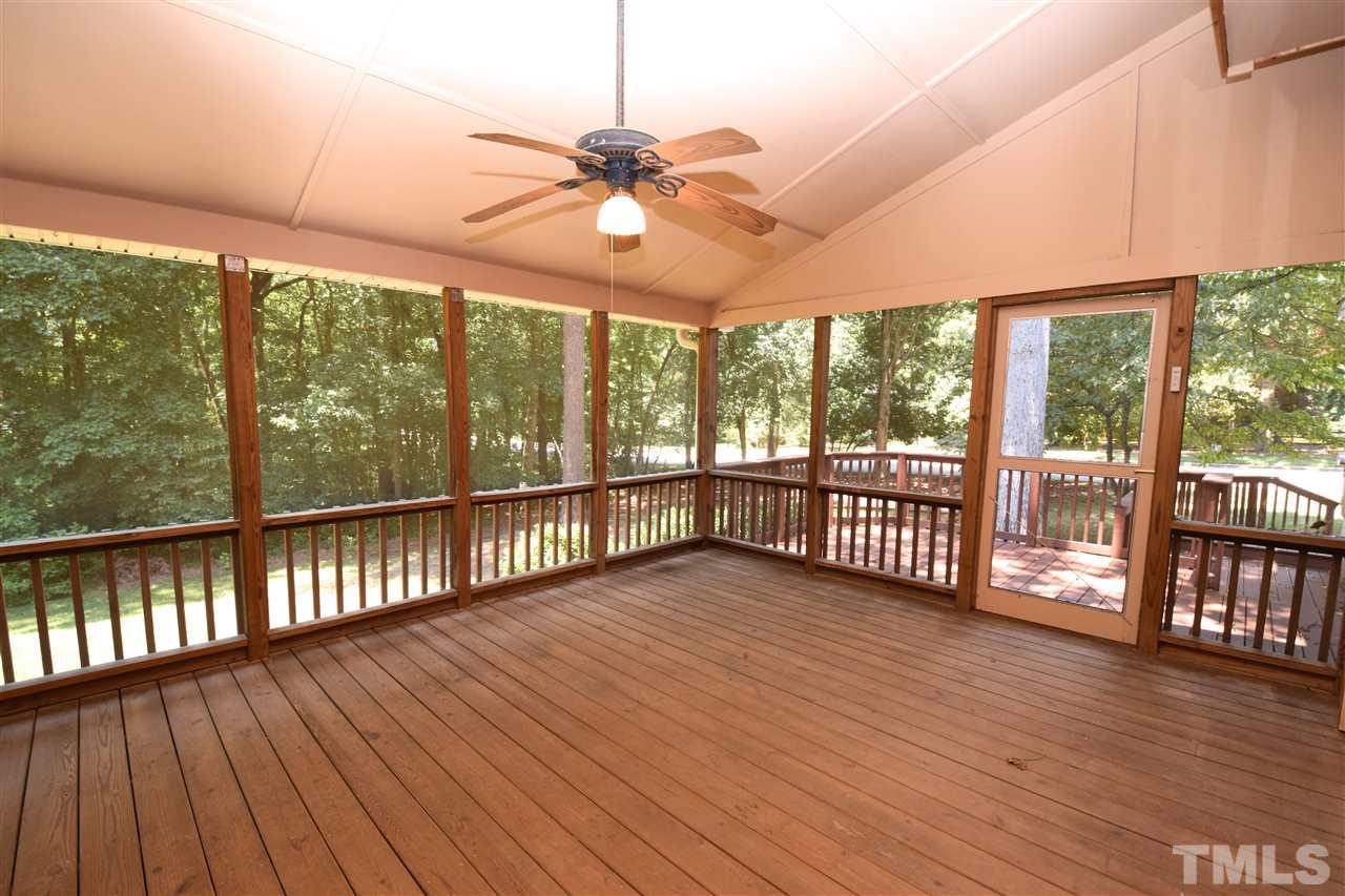 9213 Litchford Road Raleigh, NC 27615 - Photo 22 of 25 a view of a porch with wooden floor
