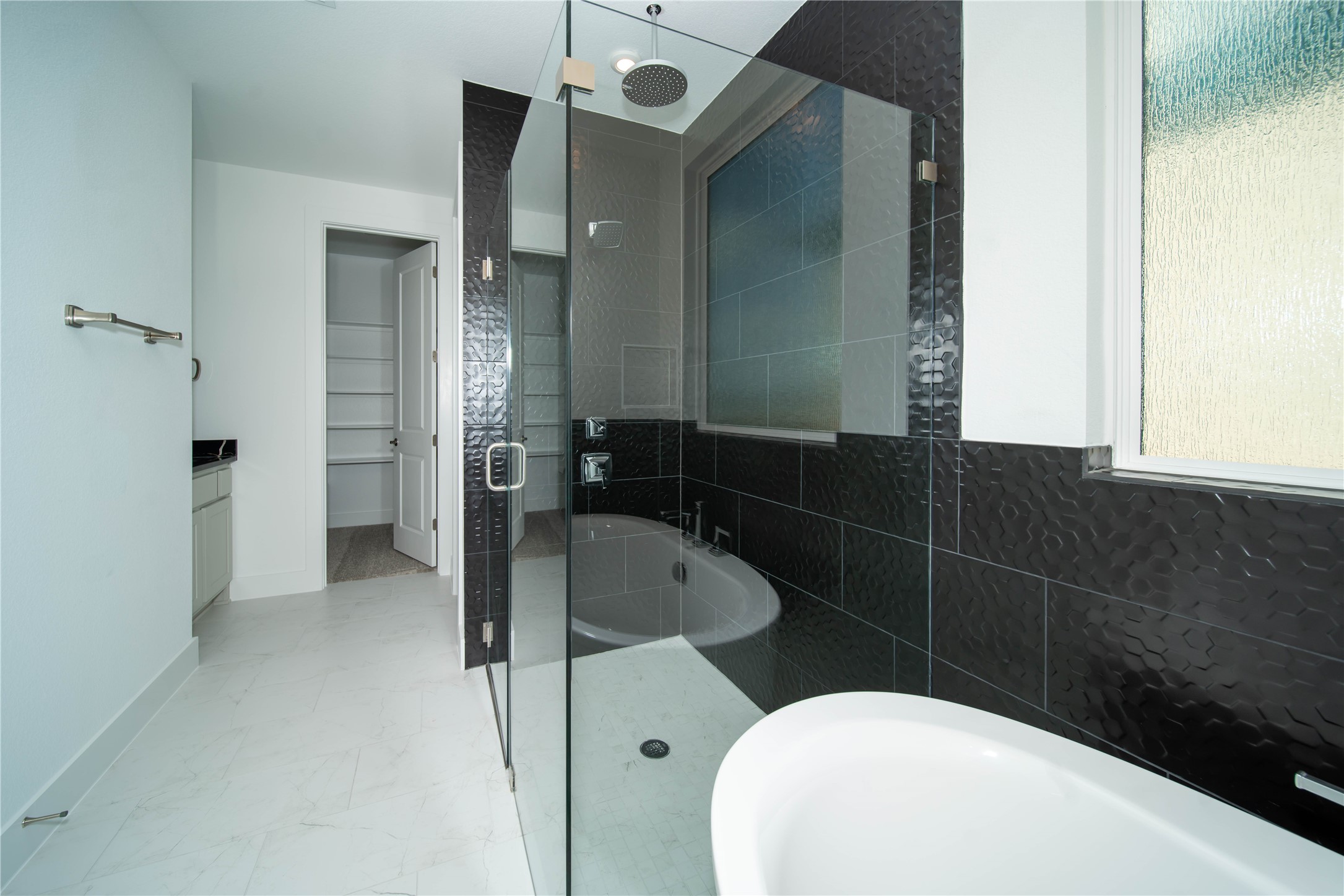 2029 Varese Path Leander, TX 78641 - Photo 13 of 32 a bathroom with a toilet and a sink
