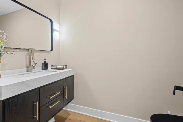 a living room with lots of furniture and a table