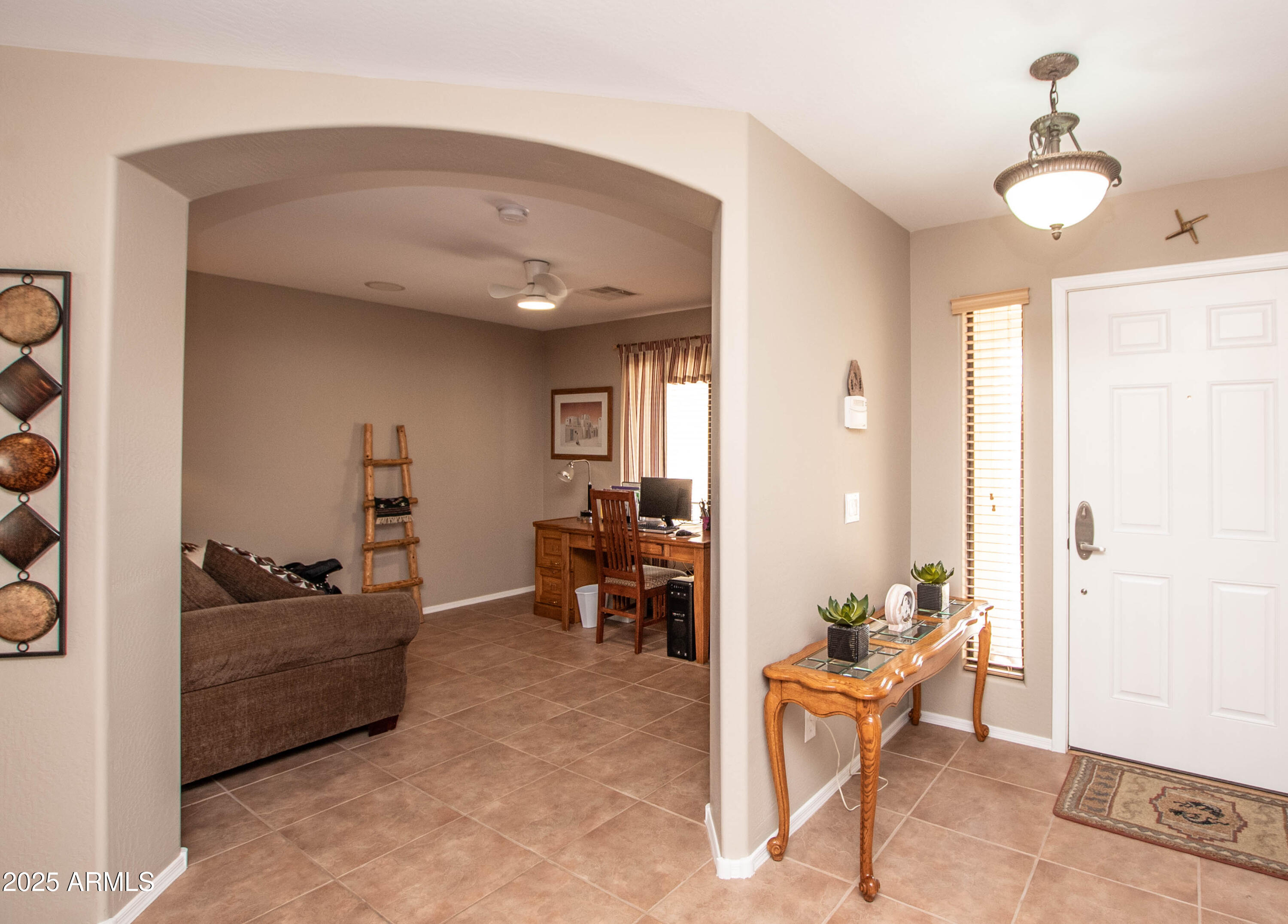 2101 South Meridian Road, Unit 176 Apache Junction, AZ 85120 - Photo 14 of 20 FOYER AND DEN