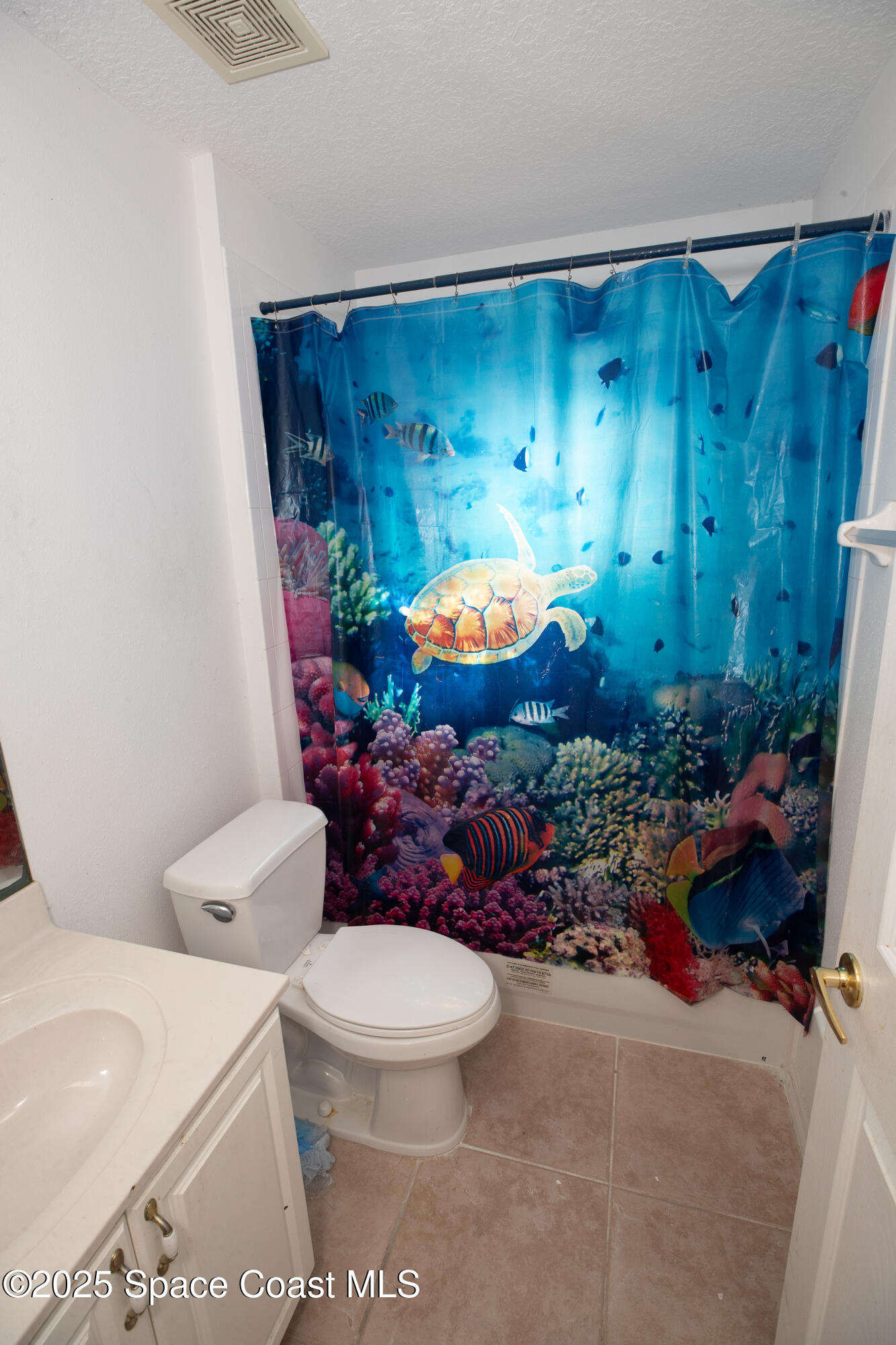 483 Wynfield Circle Rockledge, FL 32955 - Photo 18 of 30 a bathroom with a toilet and a shower