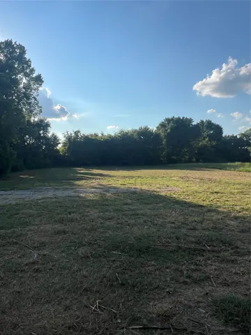 a view of an ocean and sunset