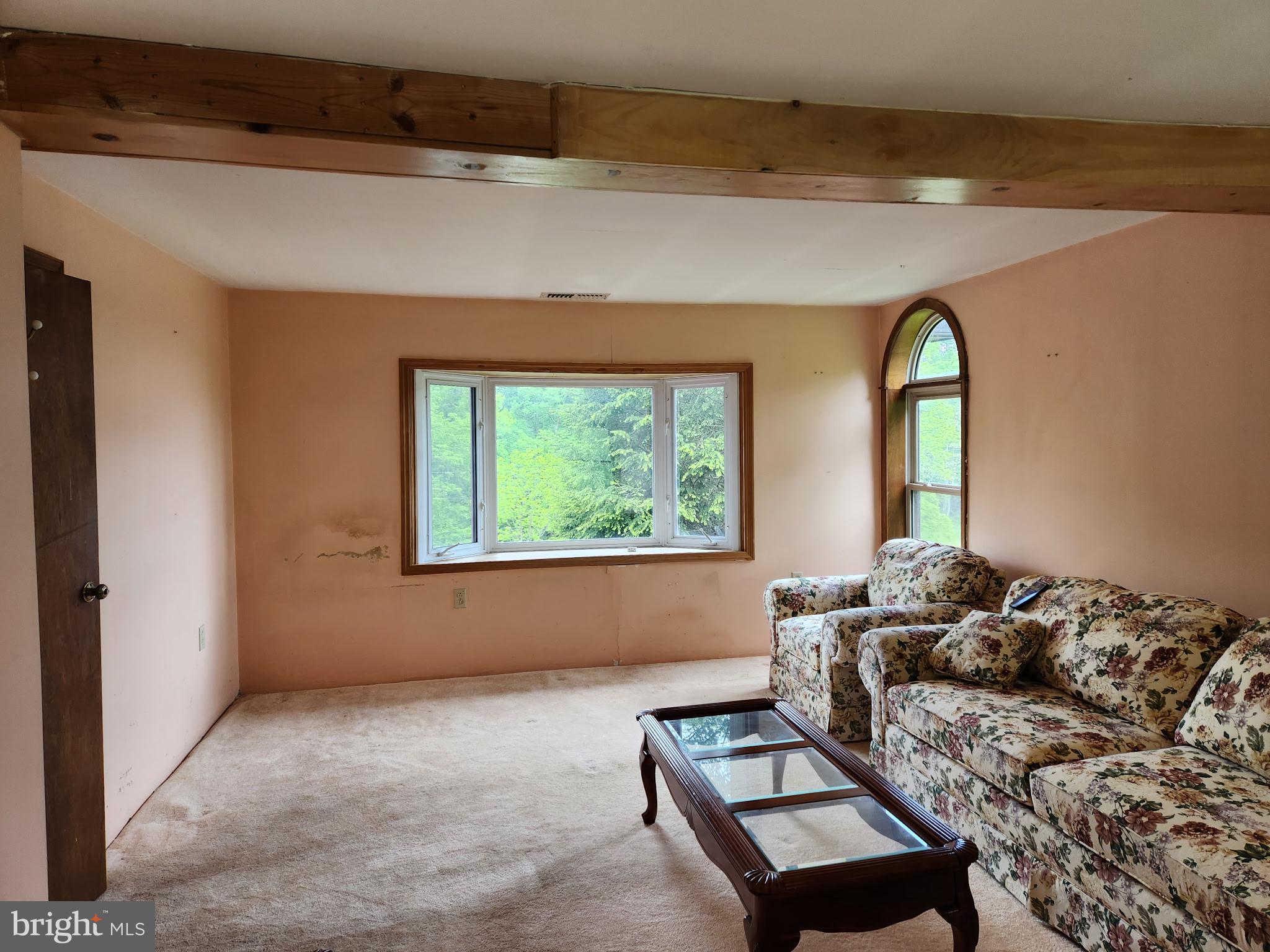 1422 Big Run Road Everett, PA 15537 - Photo 11 of 35 a living room with furniture and a window