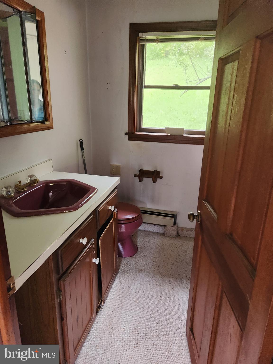 1422 Big Run Road Everett, PA 15537 - Photo 12 of 35 a bathroom with a sink and a toilet