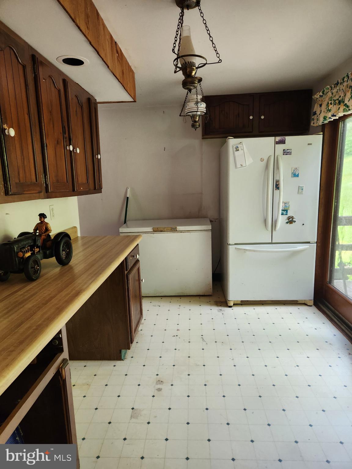 1422 Big Run Road Everett, PA 15537 - Photo 8 of 35 a kitchen with a sink a stove and refrigerator