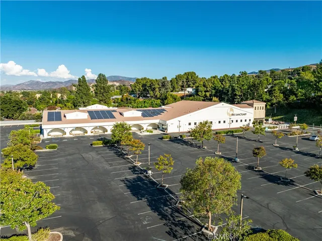 a view of a city with lots of trees