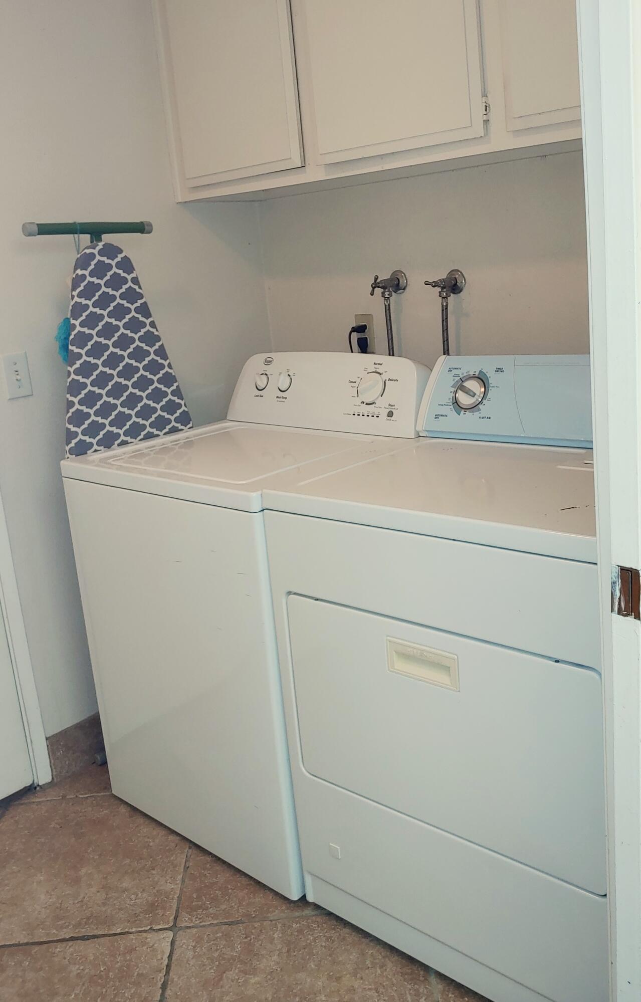 69940 Los Cocos Court Rancho Mirage, CA 92270 - Photo 29 of 37 a utility room with dryer and washer