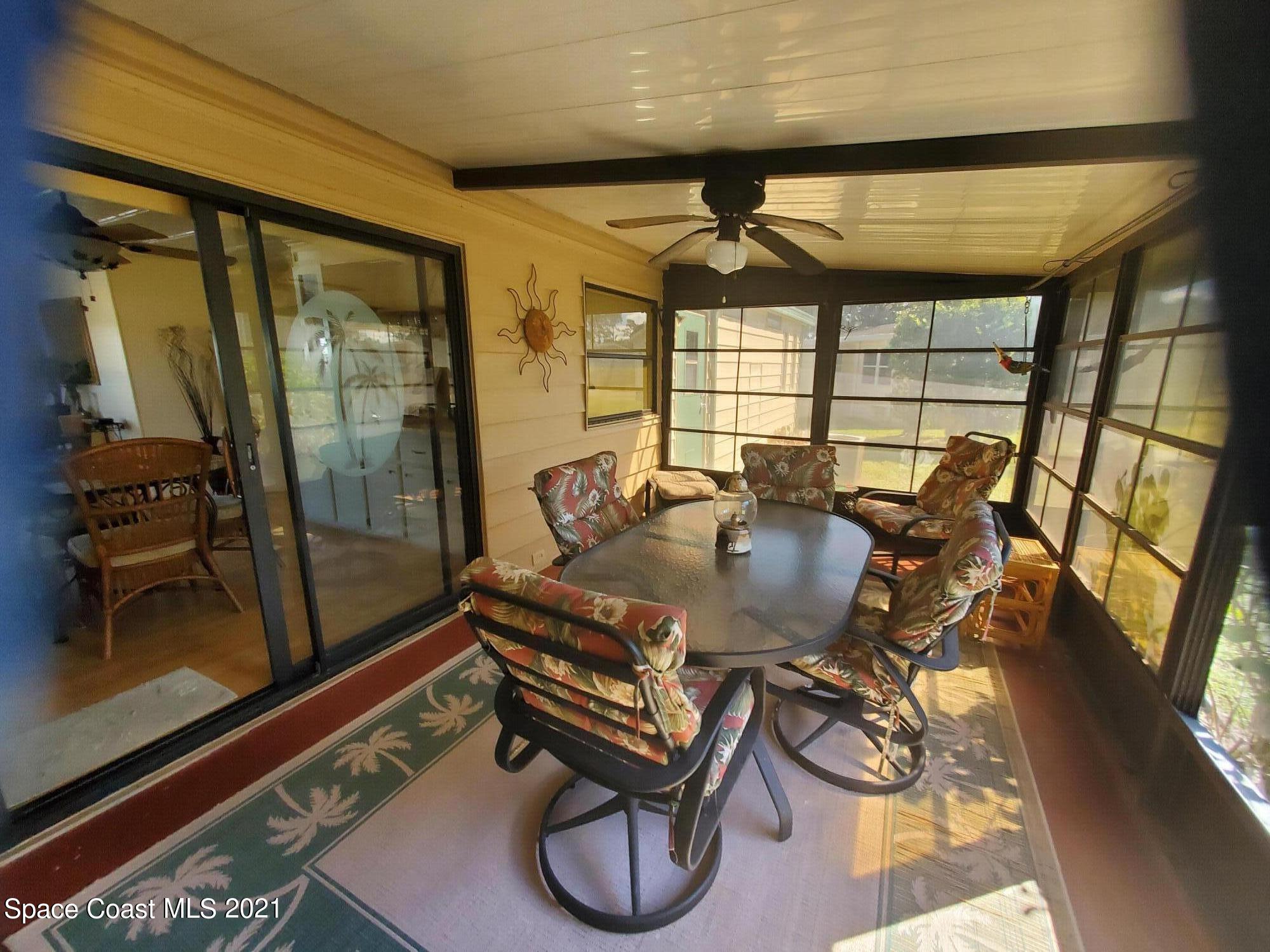 327 Macadamia Drive Sebastian, FL 32976 - Photo 3 of 31 a dining room with furniture and window