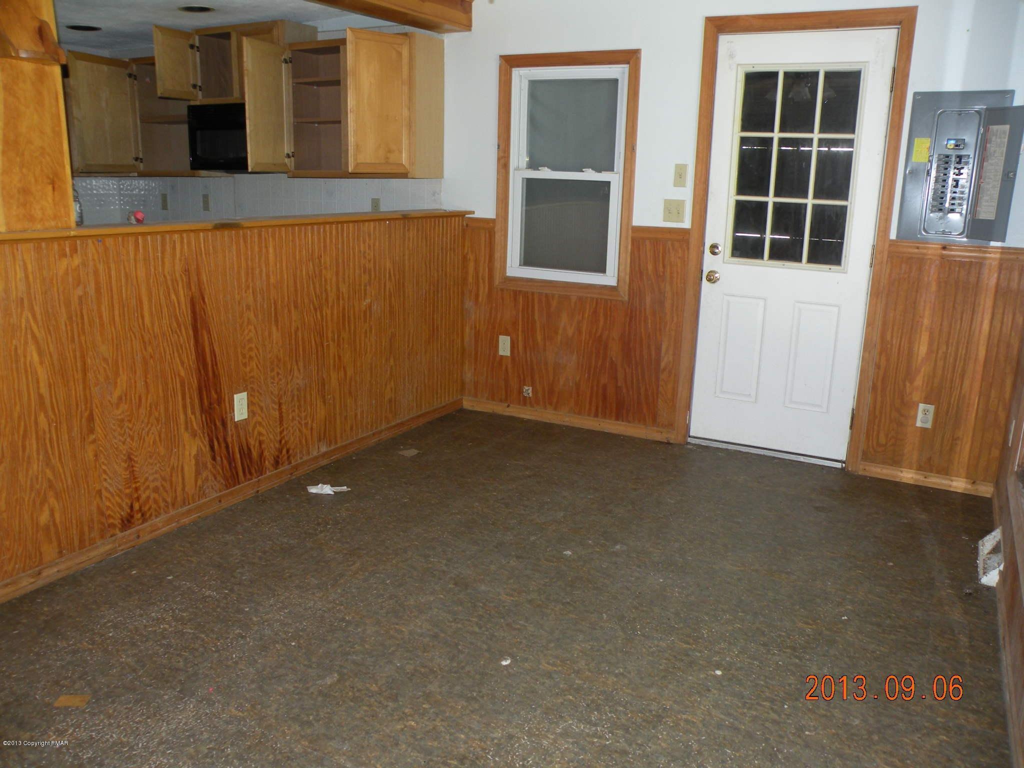 504 Eastbrook Road Effort, PA 18330 - Photo 4 of 10 a view of an empty room with a window