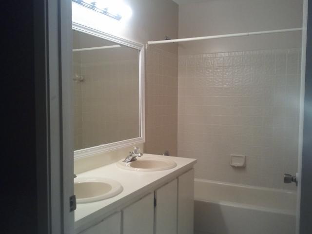21260 Summertrace Circle Boca Raton, FL 33428 - Photo 12 of 18 a bathroom with a sink and a mirror