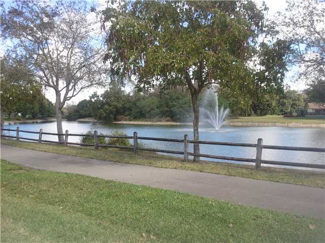 21260 Summertrace Circle Boca Raton, FL 33428 - Photo 17 of 18 a view of a yard with an tree