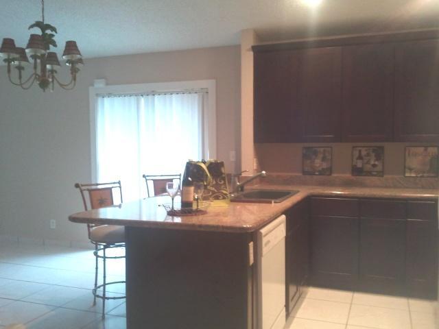 21260 Summertrace Circle Boca Raton, FL 33428 - Photo 2 of 18 a kitchen with a sink cabinets and a window