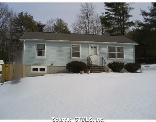 252 Breakneck Hill Road Killingly, CT 06241 - Photo 1 of 1 a view of a house with a yard covered with snow in front of house