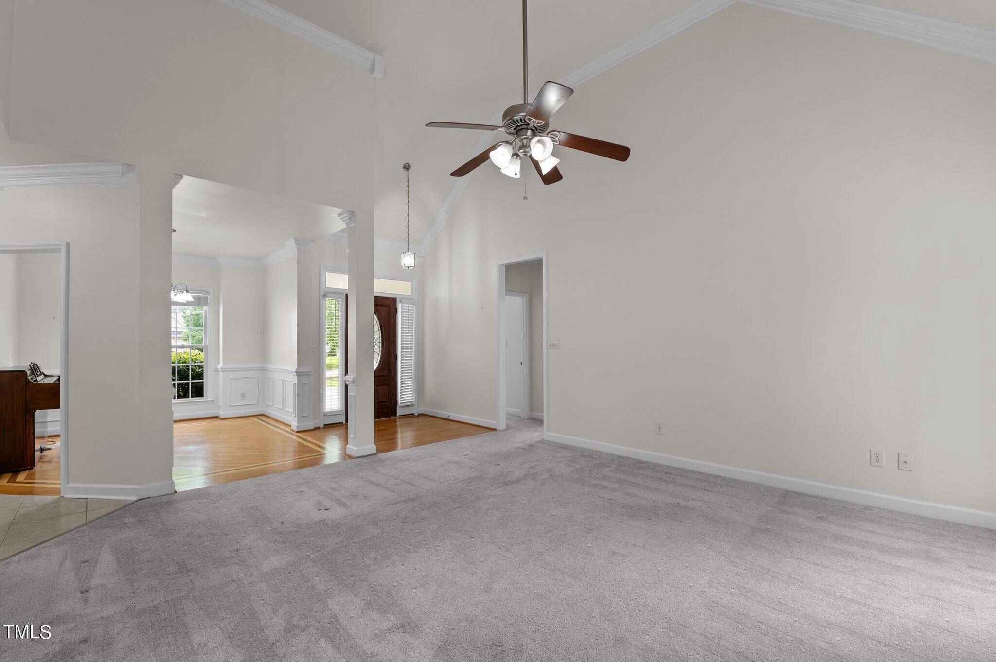 604 Middle Bridge Road Wake Forest, NC 27587 - Photo 11 of 48 a view of a livingroom with a staircase
