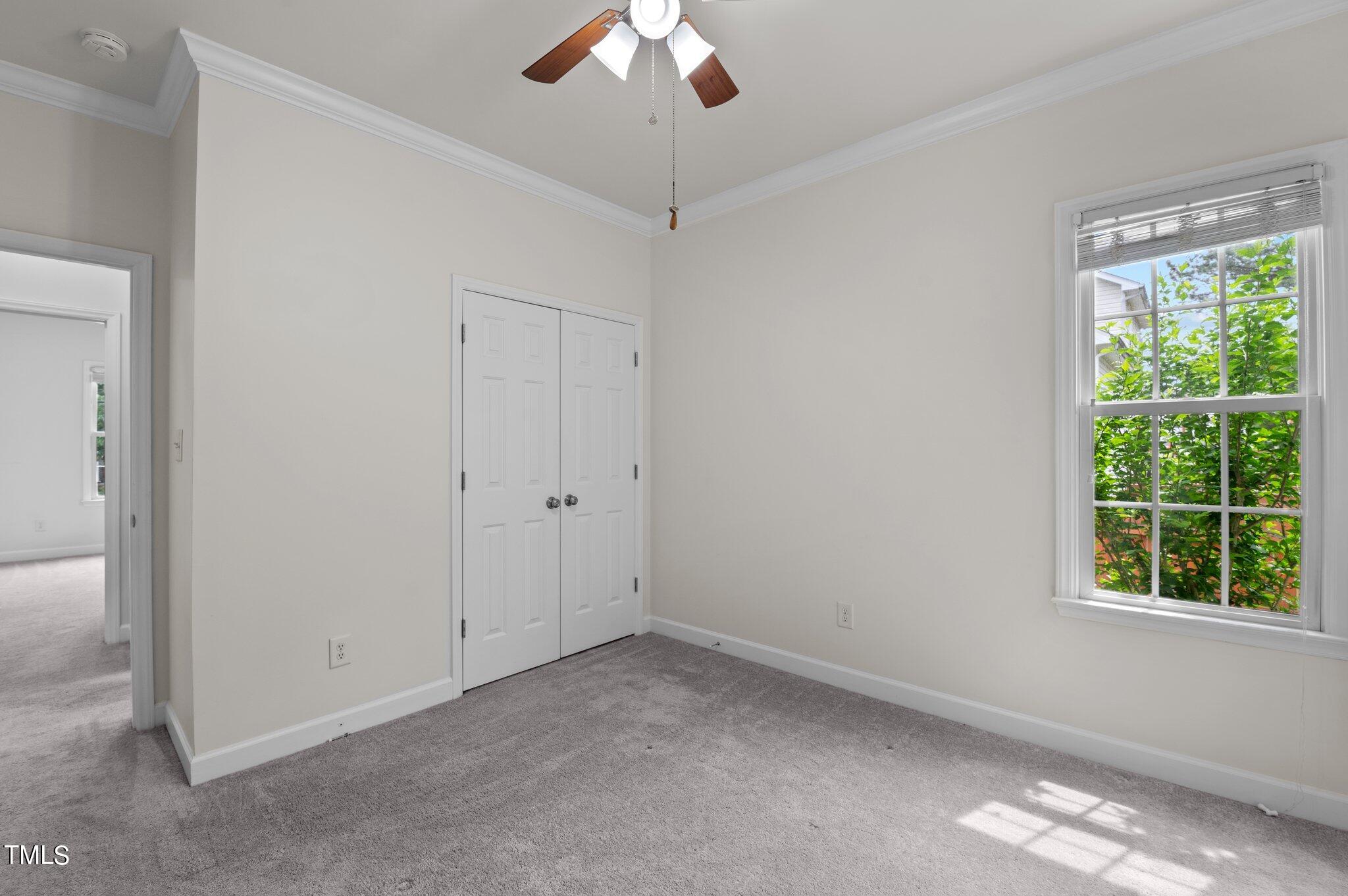 604 Middle Bridge Road Wake Forest, NC 27587 - Photo 16 of 48 a view of room with window and ceiling fan