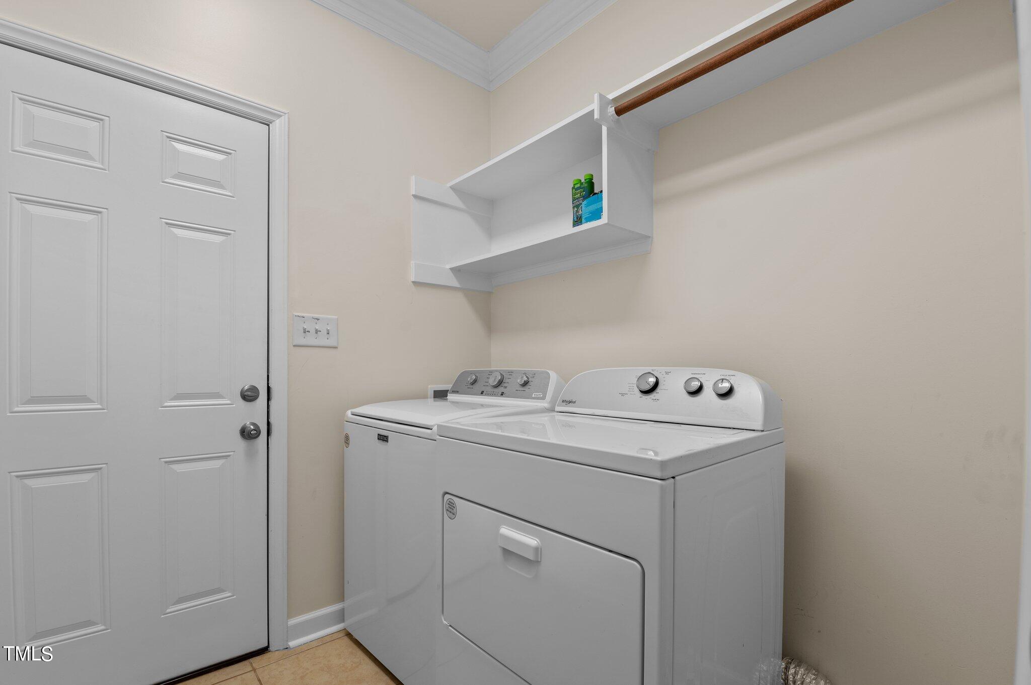 604 Middle Bridge Road Wake Forest, NC 27587 - Photo 20 of 48 a view of storage utility room with washer and dryer