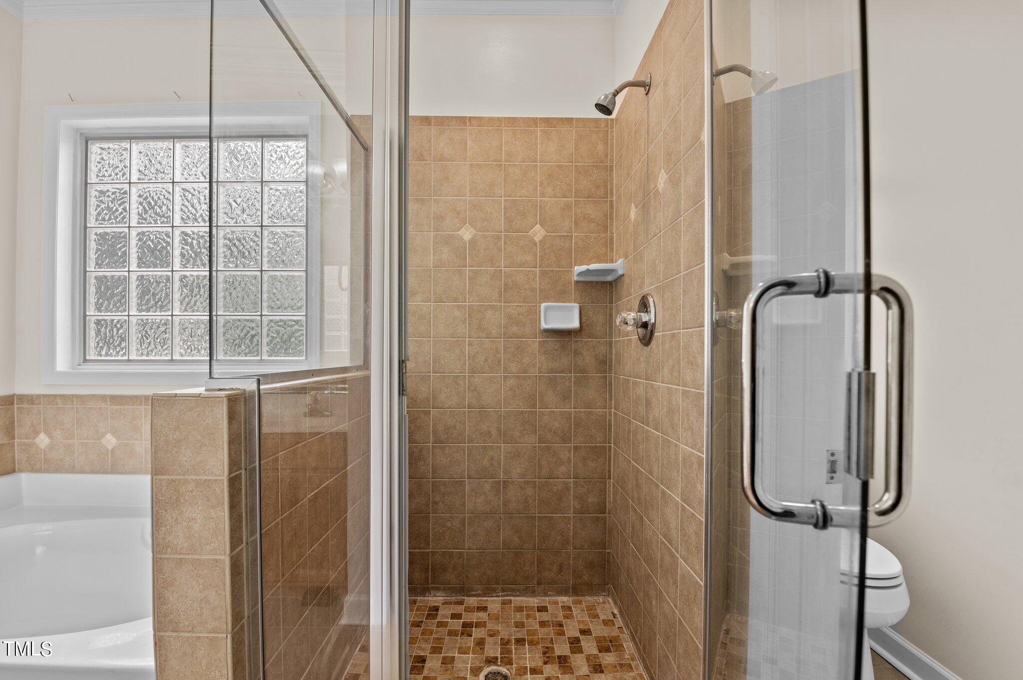 604 Middle Bridge Road Wake Forest, NC 27587 - Photo 25 of 48 a bathroom with a shower