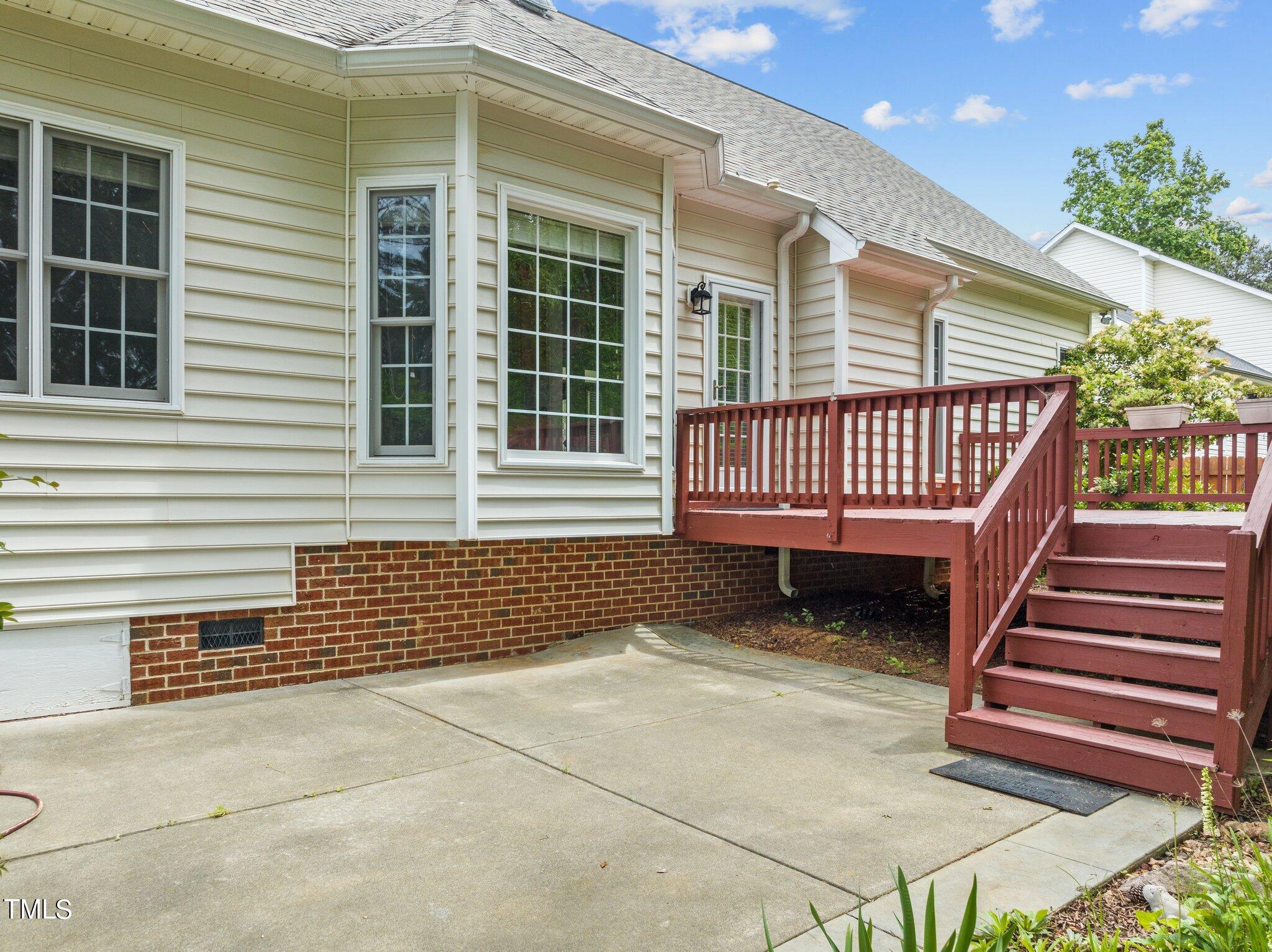 604 Middle Bridge Road Wake Forest, NC 27587 - Photo 33 of 48 a front view of a house with a balcony