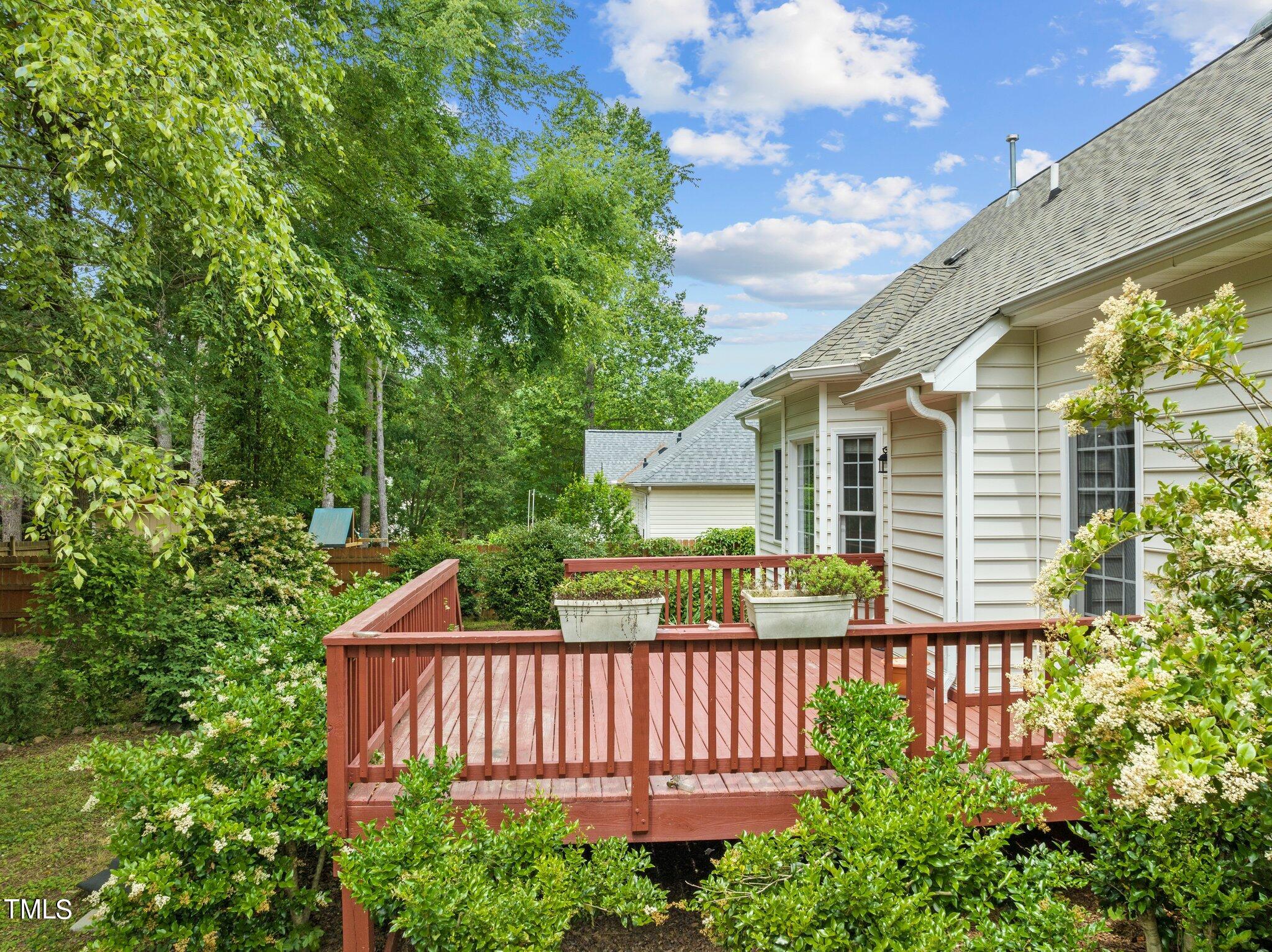 604 Middle Bridge Road Wake Forest, NC 27587 - Photo 37 of 48 a front view of a house with garden