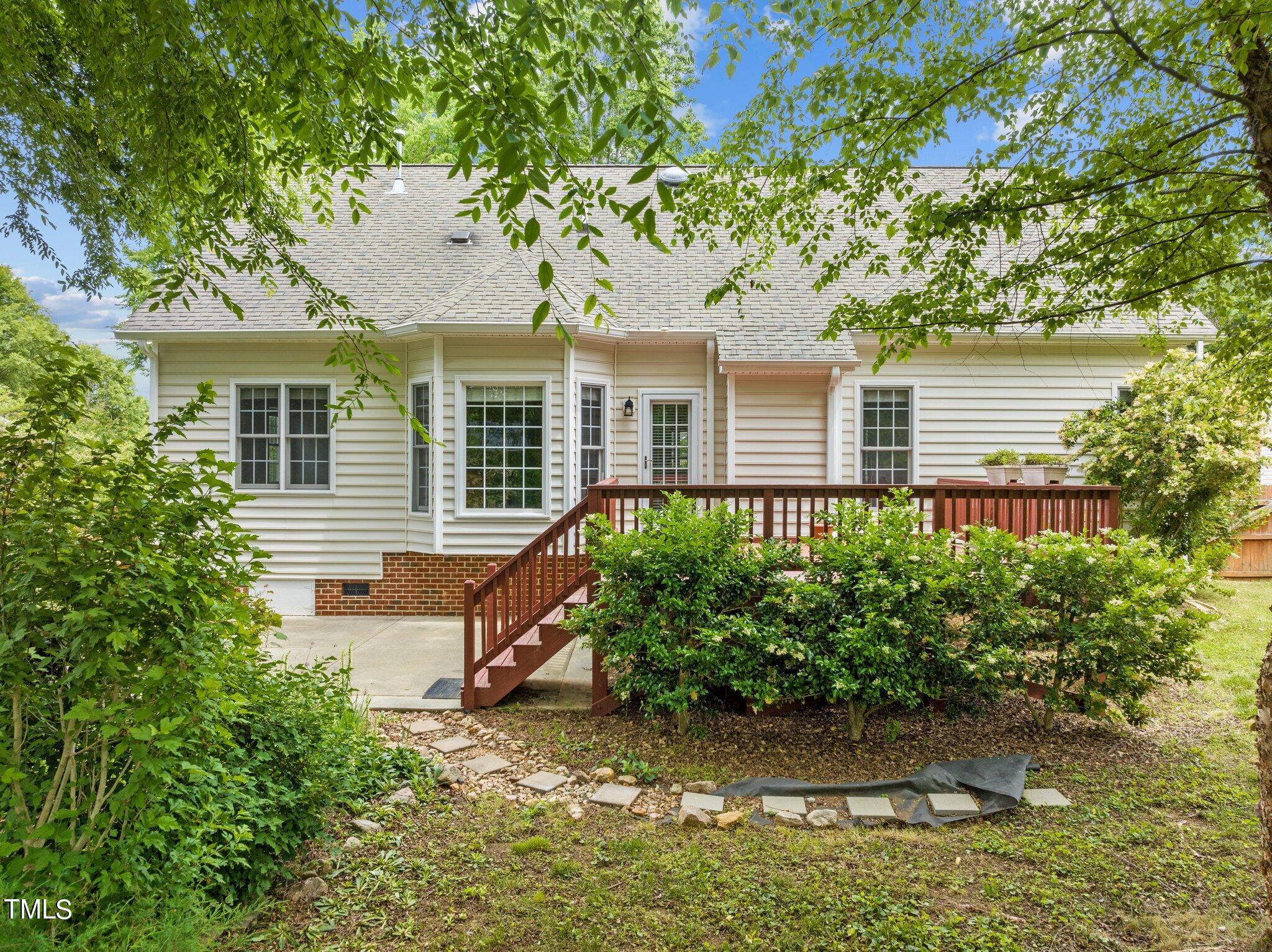 604 Middle Bridge Road Wake Forest, NC 27587 - Photo 39 of 48 a front view of a house with a yard