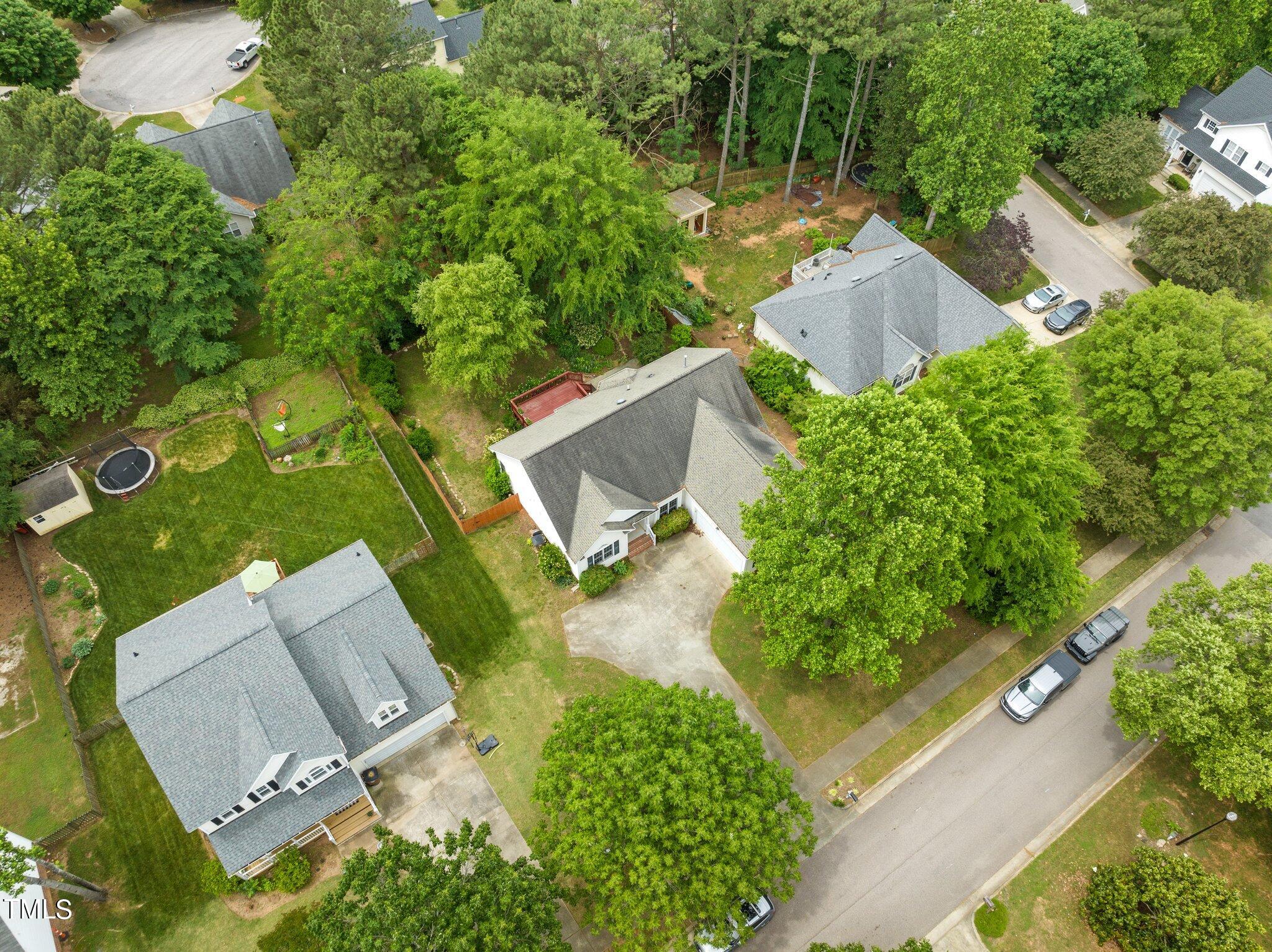 604 Middle Bridge Road Wake Forest, NC 27587 - Photo 45 of 48 an aerial view of a house with a yard