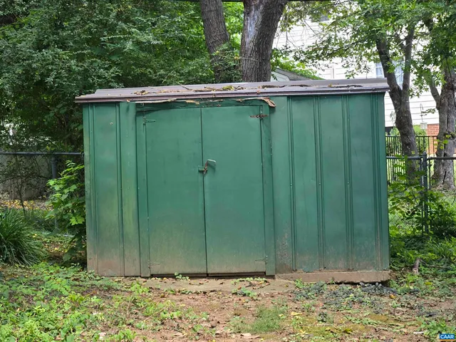 a backyard of a house with seating space