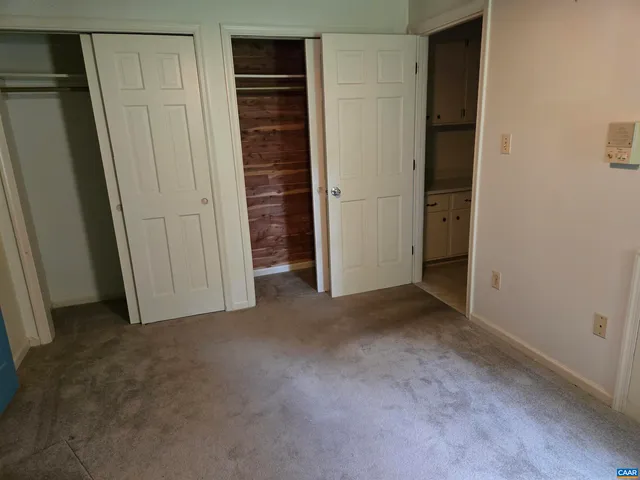 an empty room with closet