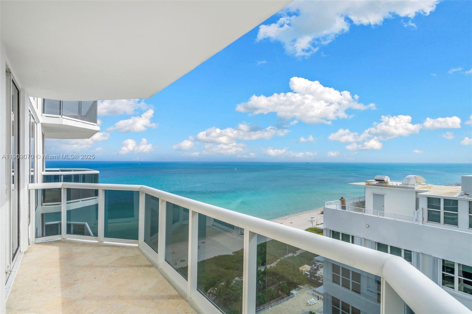 4775 Collins Avenue, Unit 1903 Miami Beach, FL 33140 - Photo 27 of 49 a view of a balcony with an ocean view