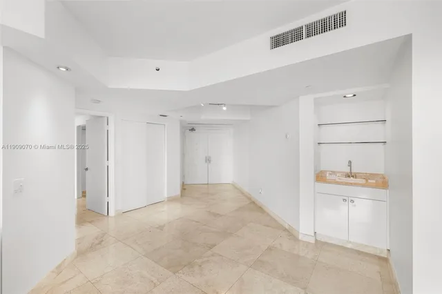 a view of a back yard from a balcony