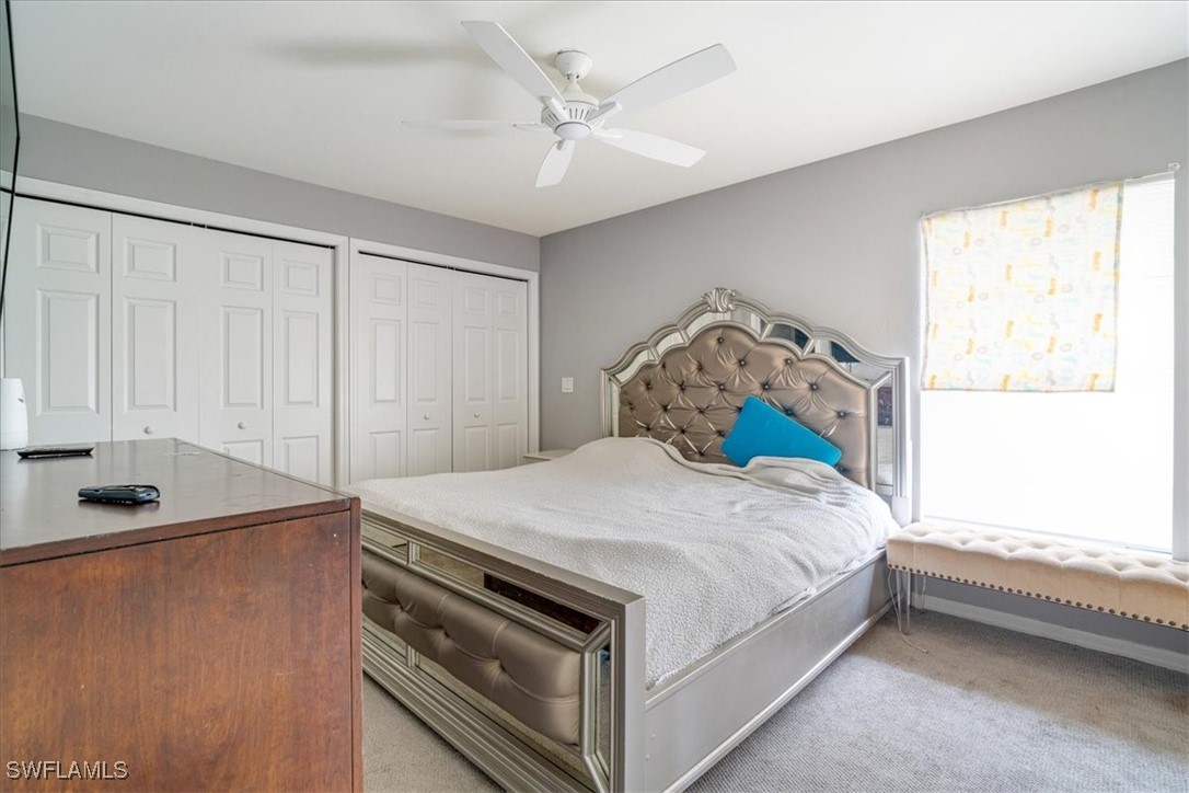 3980 Sunset Road Lehigh Acres, FL 33971 - Photo 24 of 42 a bedroom with a bed and a window