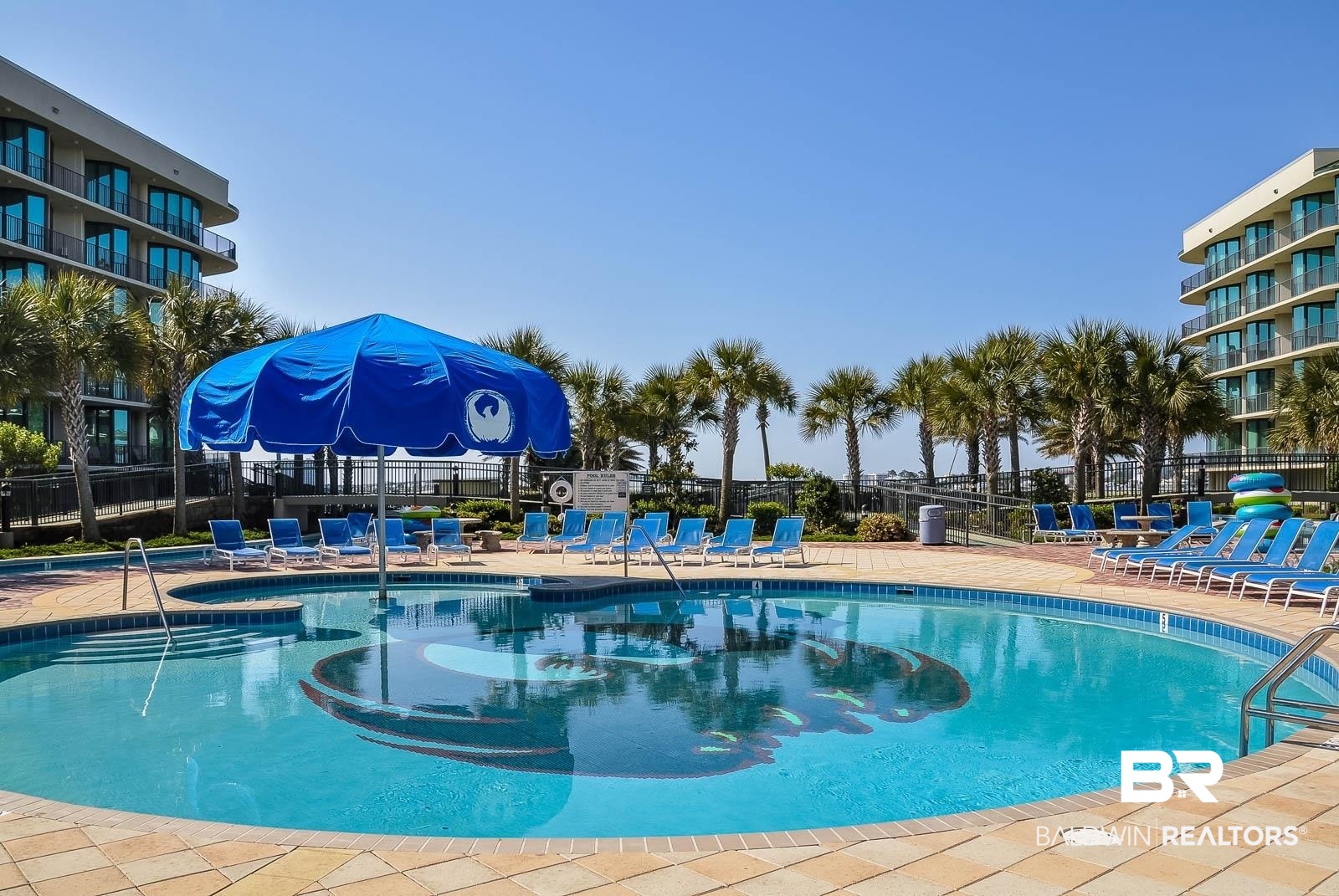 27580 Canal Road, Unit 1429 Orange Beach, AL 36561 - Photo 25 of 45 Community pool featuring a patio area