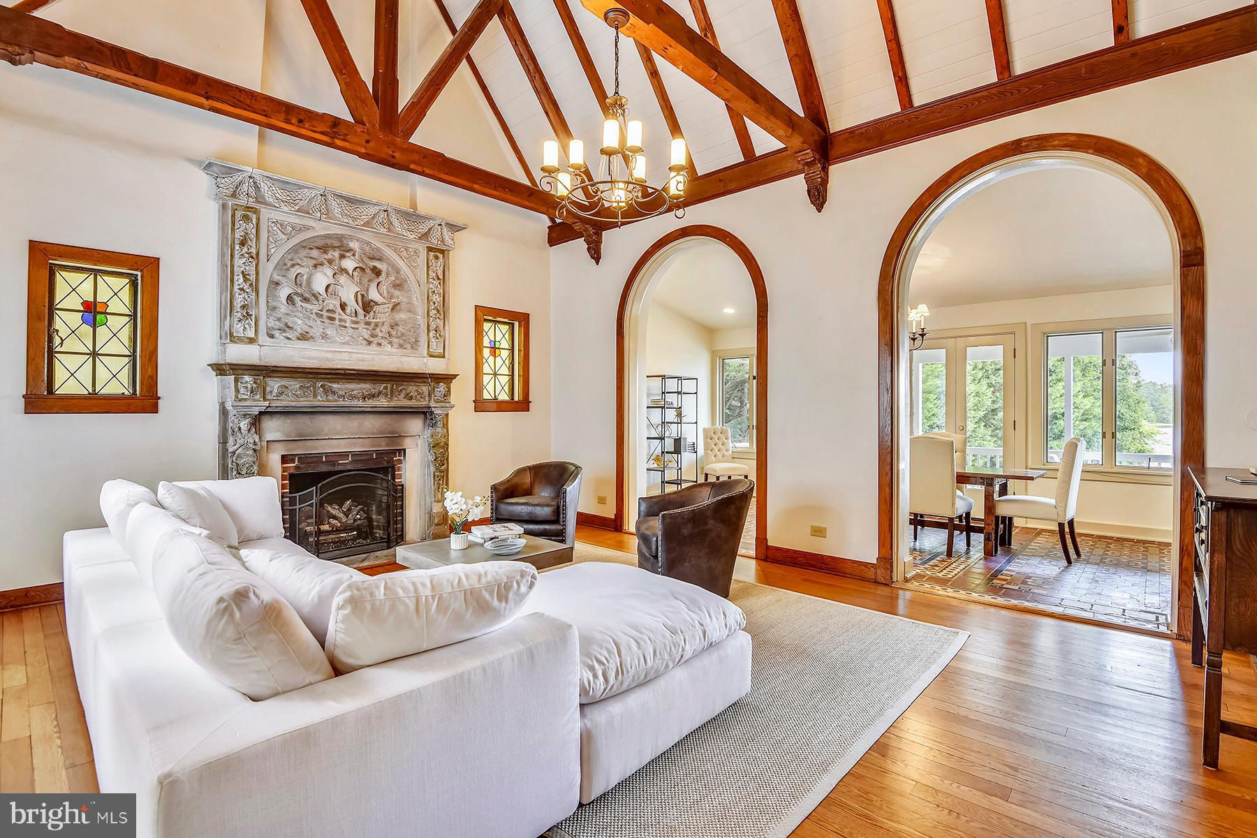 421 Ferry Point Road Annapolis, MD 21403 - Photo 11 of 51 30 ft ceiling: living room has original carvings