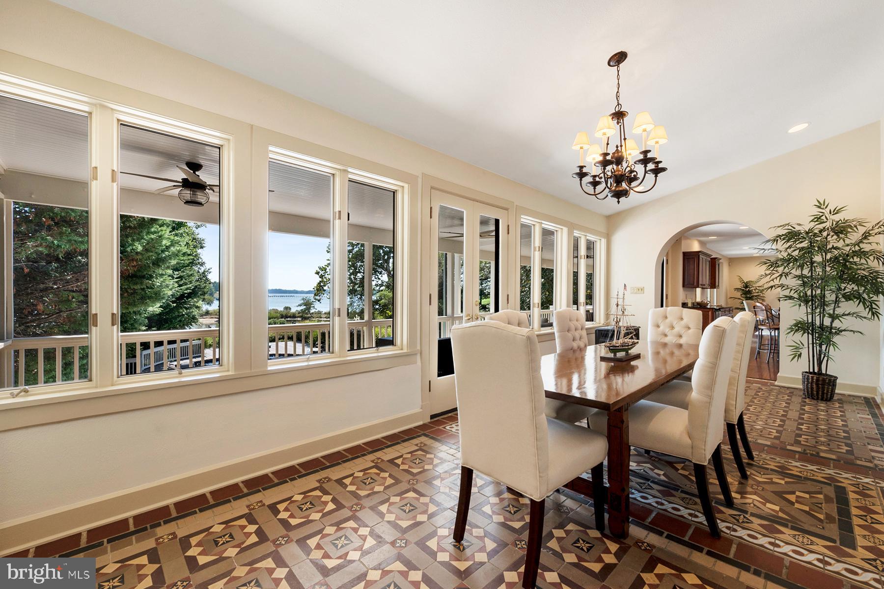 421 Ferry Point Road Annapolis, MD 21403 - Photo 13 of 51 Wall of windows: waterview in the dining room