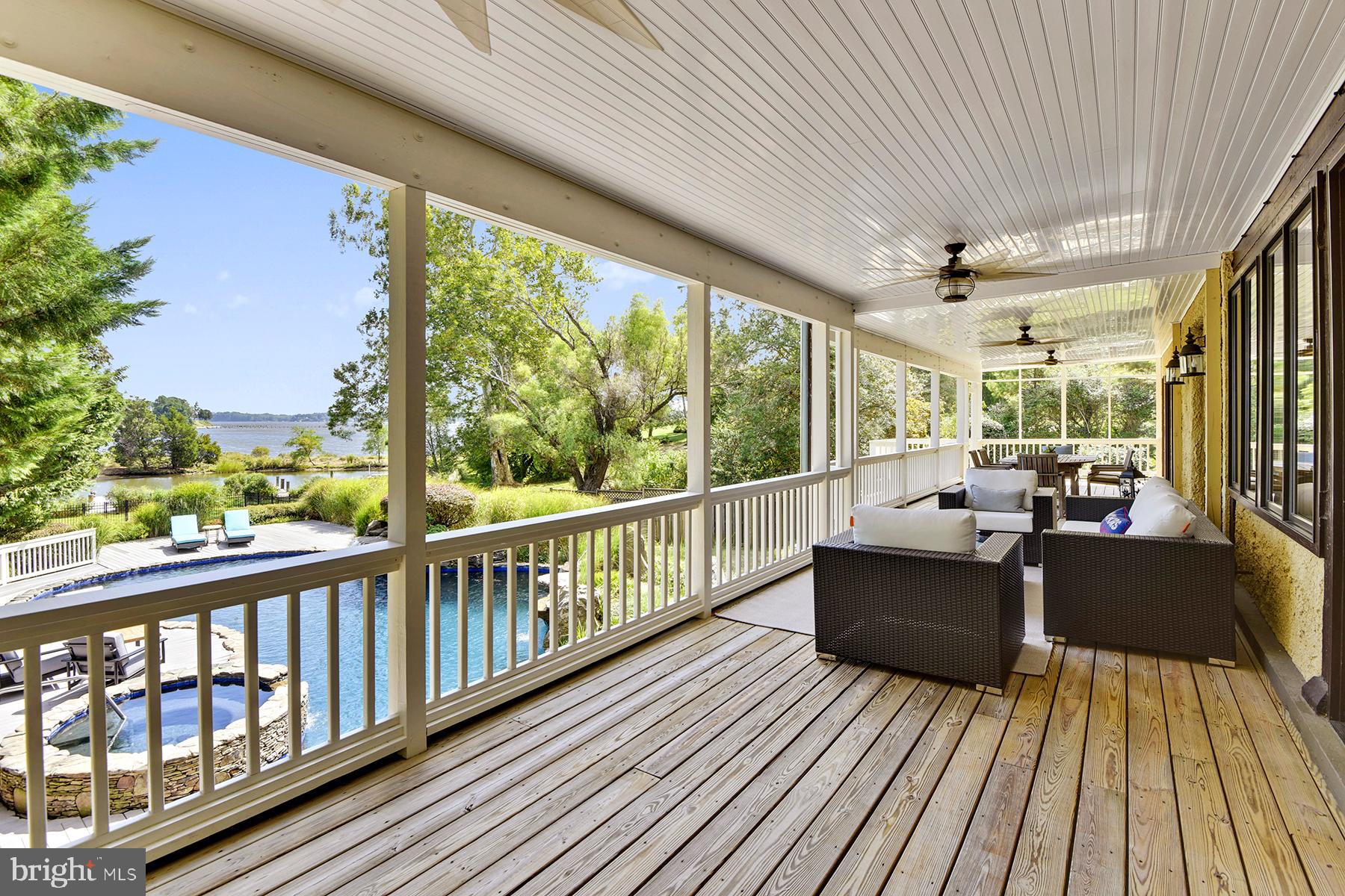 421 Ferry Point Road Annapolis, MD 21403 - Photo 15 of 51 Step out from the dining room to the huge porch