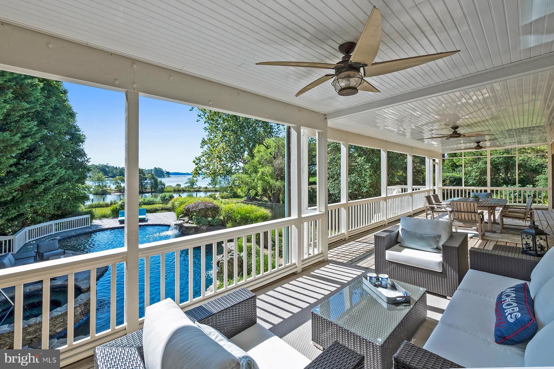 421 Ferry Point Road Annapolis, MD 21403 - Photo 16 of 51 Comfortable seating overlooking the pool and river