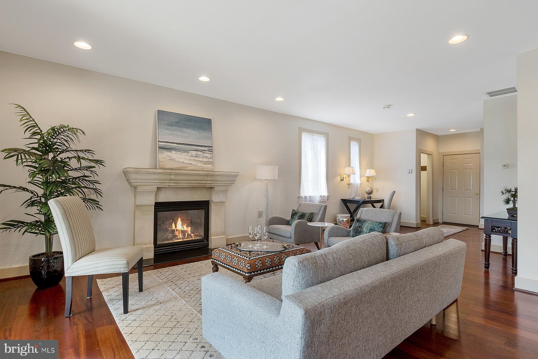 421 Ferry Point Road Annapolis, MD 21403 - Photo 18 of 51 Gas fireplace with limestone surround