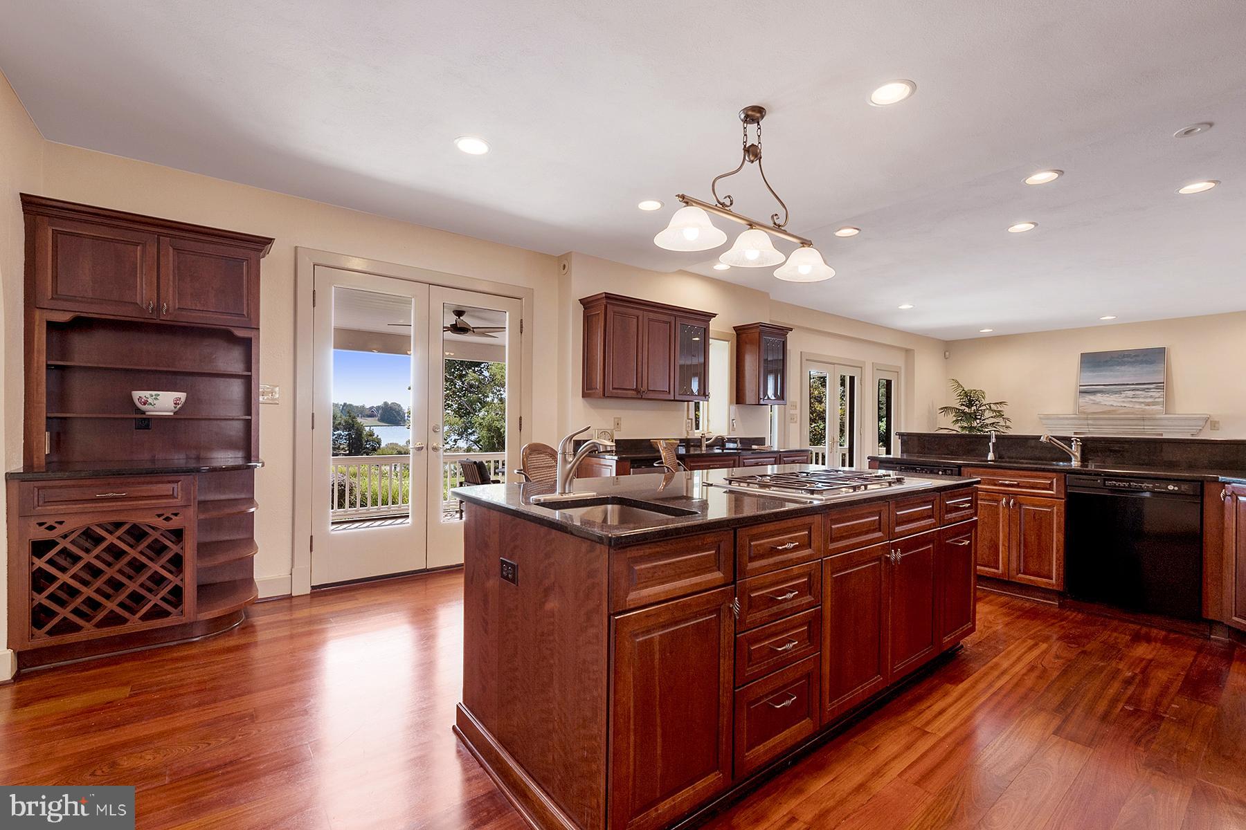 421 Ferry Point Road Annapolis, MD 21403 - Photo 25 of 51 Center island has a cooktop and prep sink