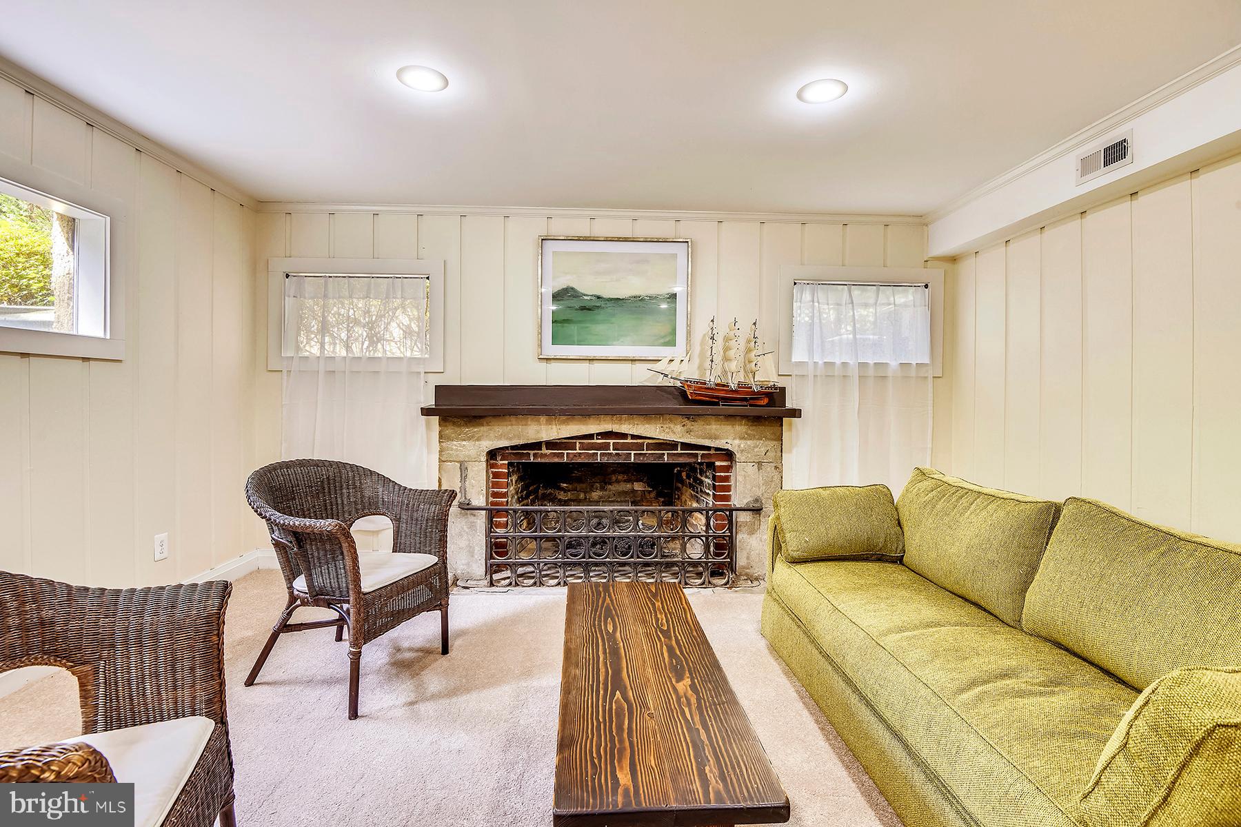 421 Ferry Point Road Annapolis, MD 21403 - Photo 44 of 51 Game room has a gas fireplace
