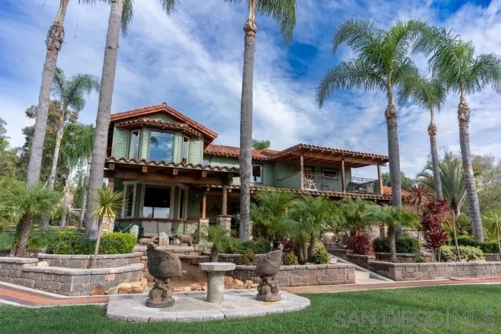 3097 Green Heather Lane Fallbrook, CA 92028 - Photo 34 of 37 a front view of a house with garden