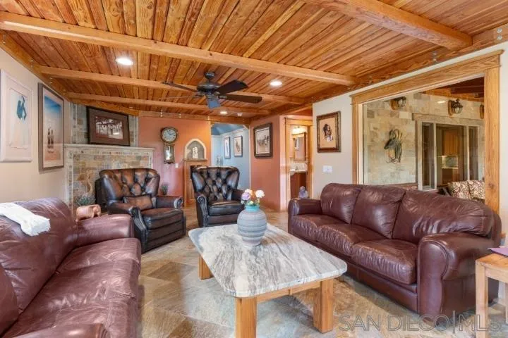 3097 Green Heather Lane Fallbrook, CA 92028 - Photo 5 of 37 a view of a livingroom with furniture and a couch