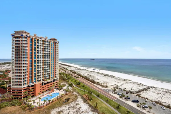 a view of a large building with an ocean view