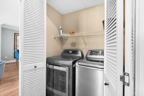 a utility room with dryer and washer