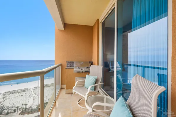 a view of balcony with patio