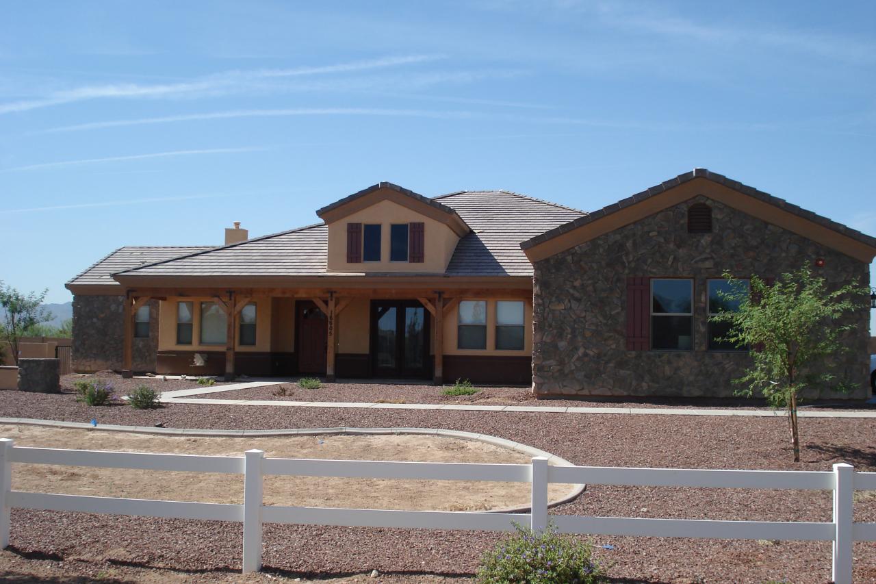 16605 West Yuma Road Goodyear, AZ 85338 - Photo 1 of 3 BEAUTIFUL NEWER CUSTOM HOME