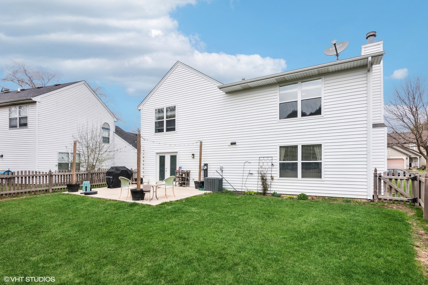 2421 Deerfield Drive Aurora, IL 60506 - Photo 17 of 22 a view of a house with backyard