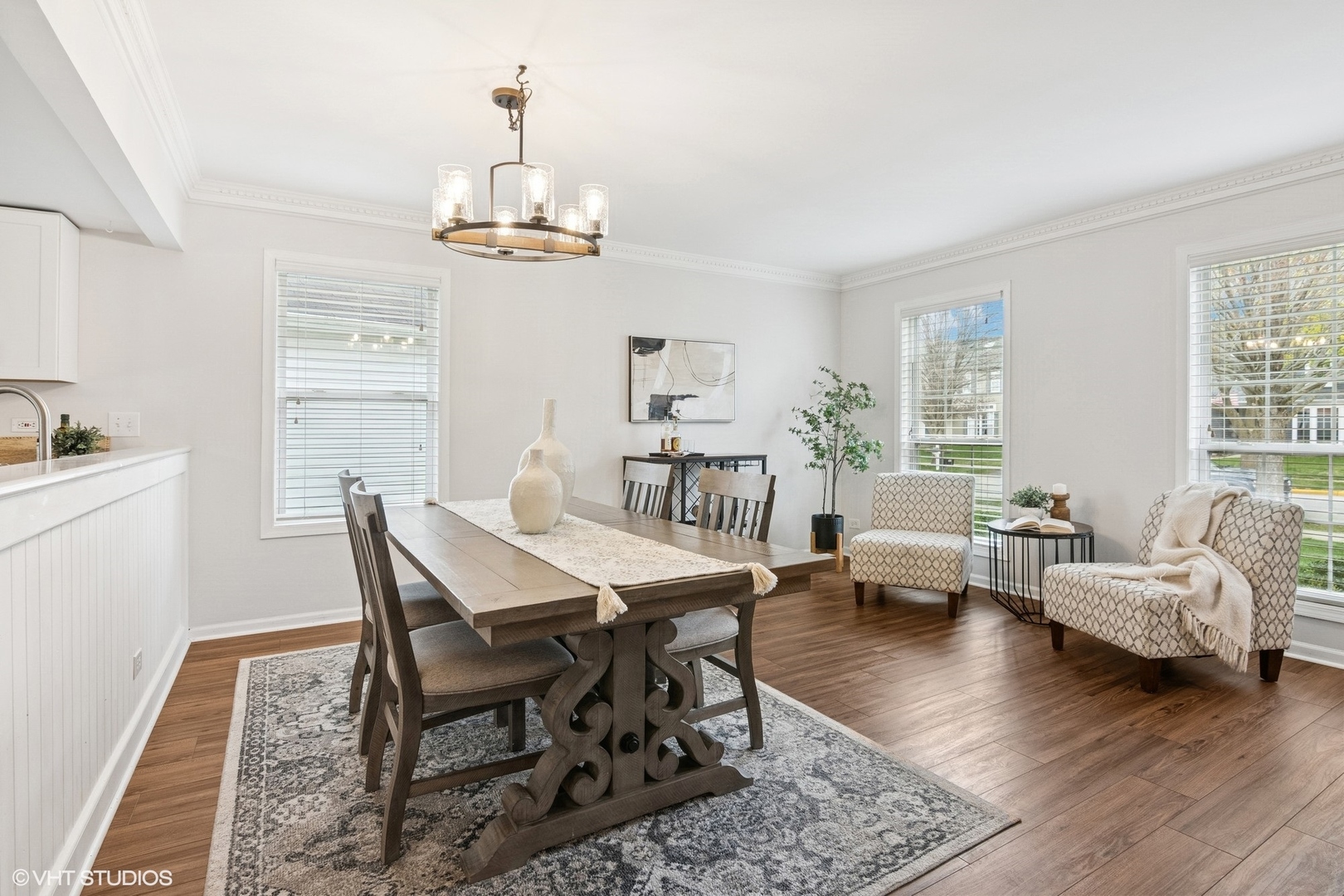 2421 Deerfield Drive Aurora, IL 60506 - Photo 3 of 22 a view of a dining room with furniture window and wooden floor
