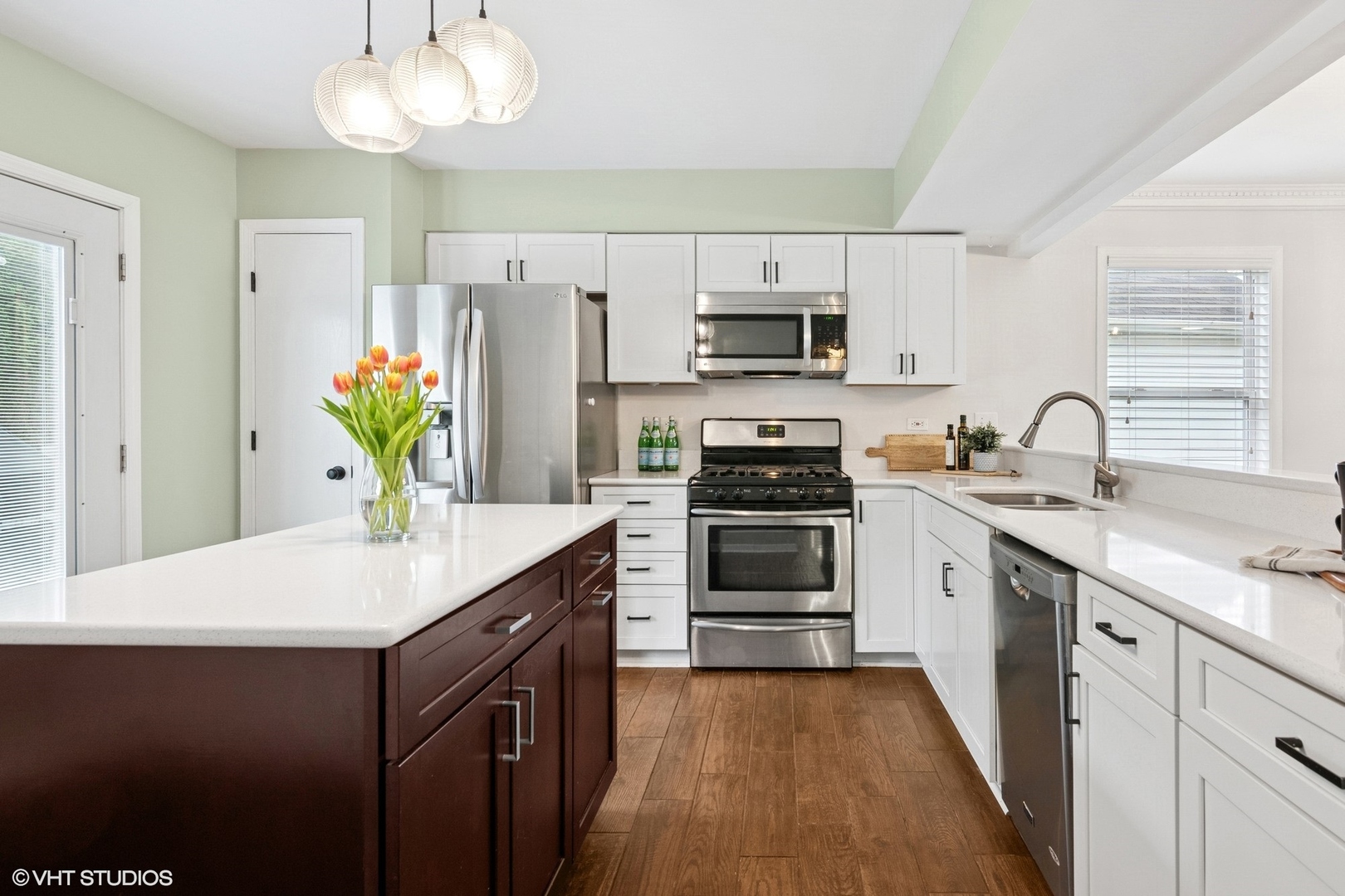 2421 Deerfield Drive Aurora, IL 60506 - Photo 6 of 22 a kitchen with stainless steel appliances a sink stove and refrigerator