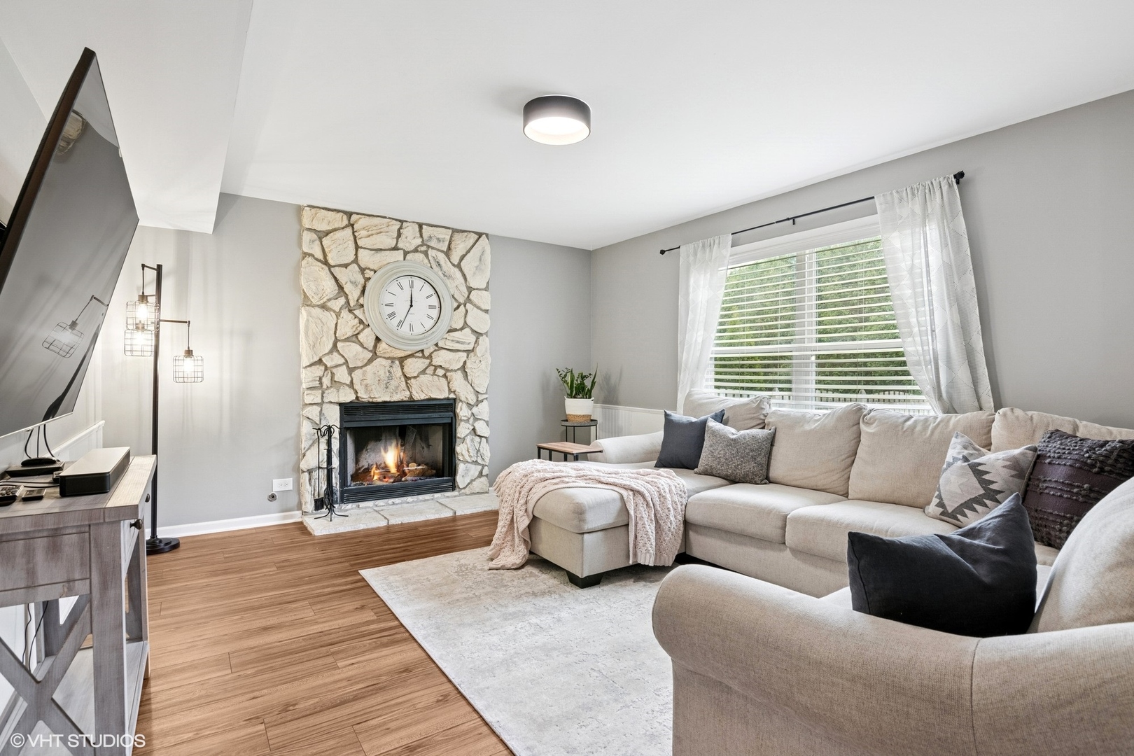 2421 Deerfield Drive Aurora, IL 60506 - Photo 8 of 22 a living room with furniture and a fireplace