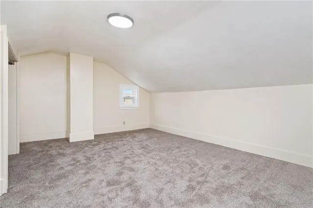 a view of a hallway with closet
